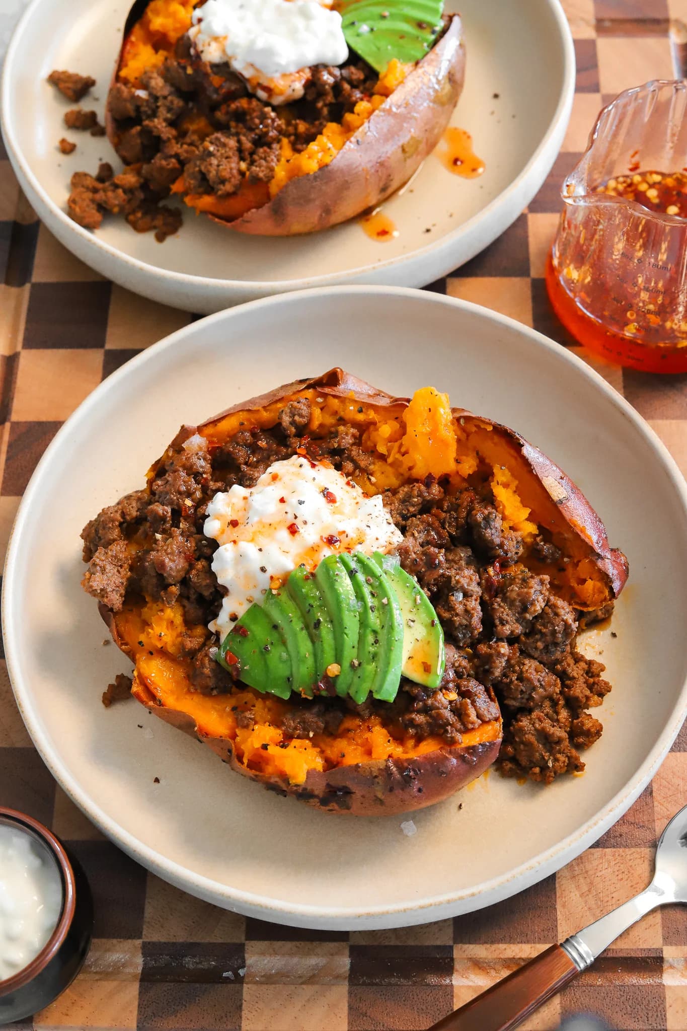 Loaded Sweet Potatoes with Spiced Beef, Cottage Cheese, and Hot Honey