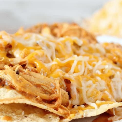 Crockpot Chicken Nachos with Creamy Salsa Con Queso