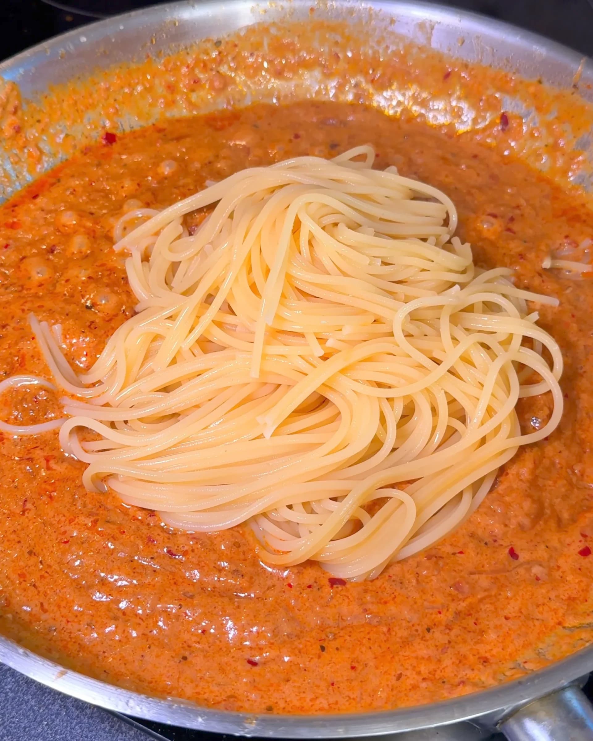 Creamy Vegan Caramelized Onion Pasta with Parmesan and Chili Oil