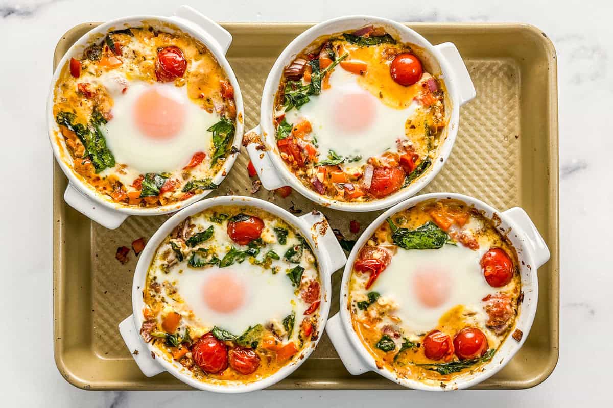 Baked Feta Eggs with Burst Tomatoes and Spinach
