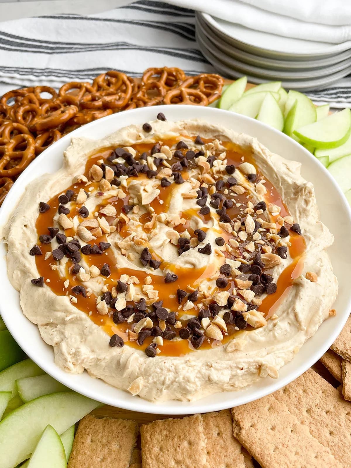 Caramel Apple Dip: Fluffy Cream Cheese Dip with Peanuts and Mini Chips