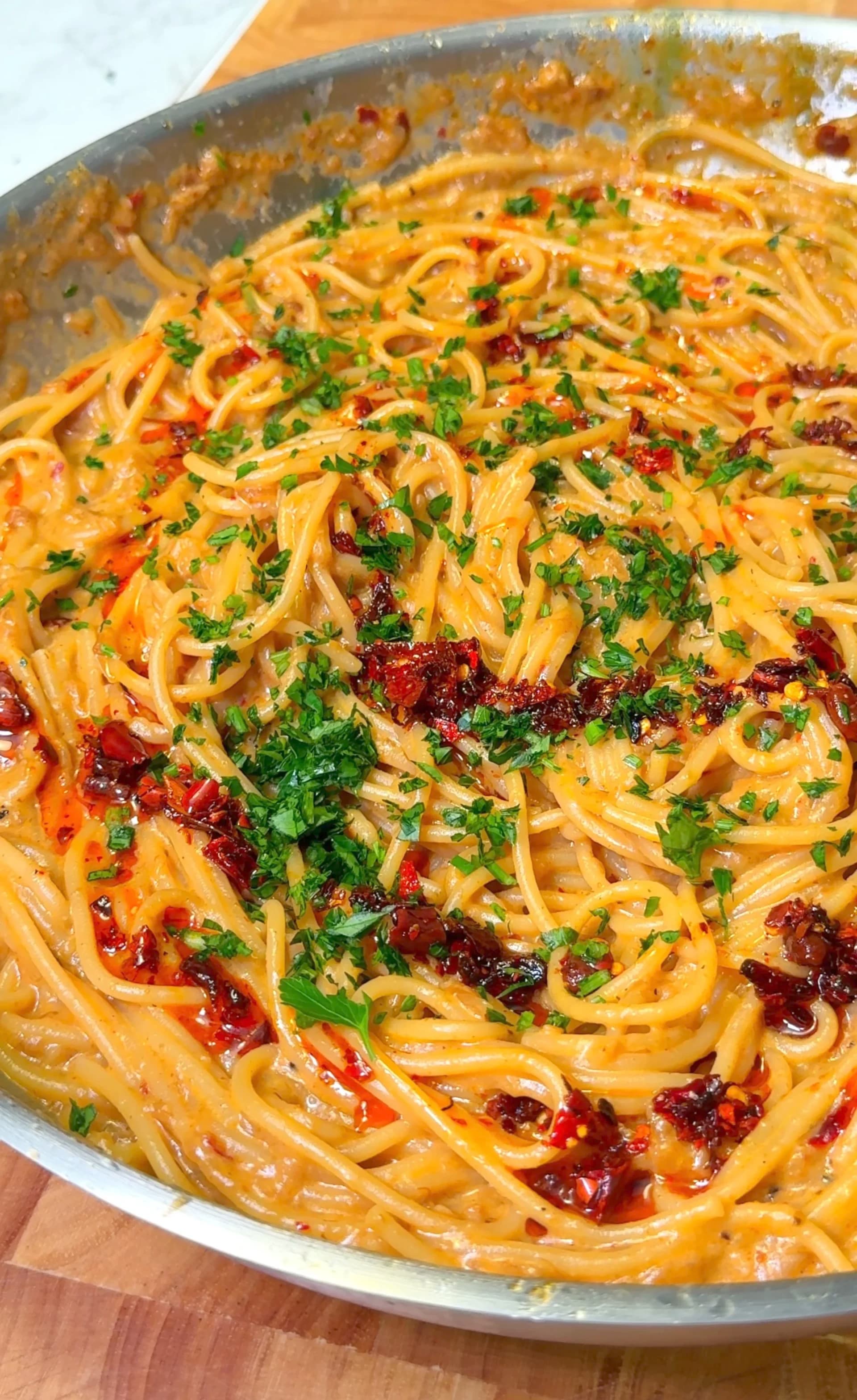 Creamy Vegan Caramelized Onion Pasta with Parmesan and Chili Oil