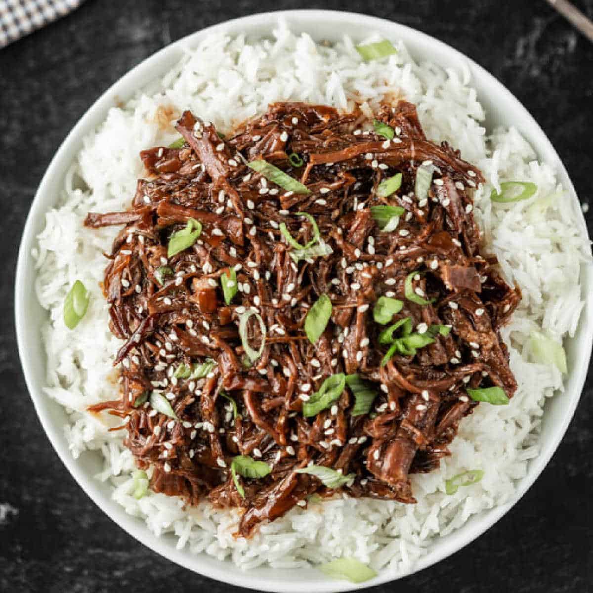 Slow Cooker Korean Beef: Tender Sweet-Savory Shredded Flank Steak