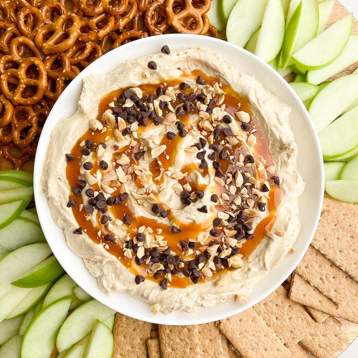 Caramel Apple Dip: Fluffy Cream Cheese Dip with Peanuts and Mini Chips