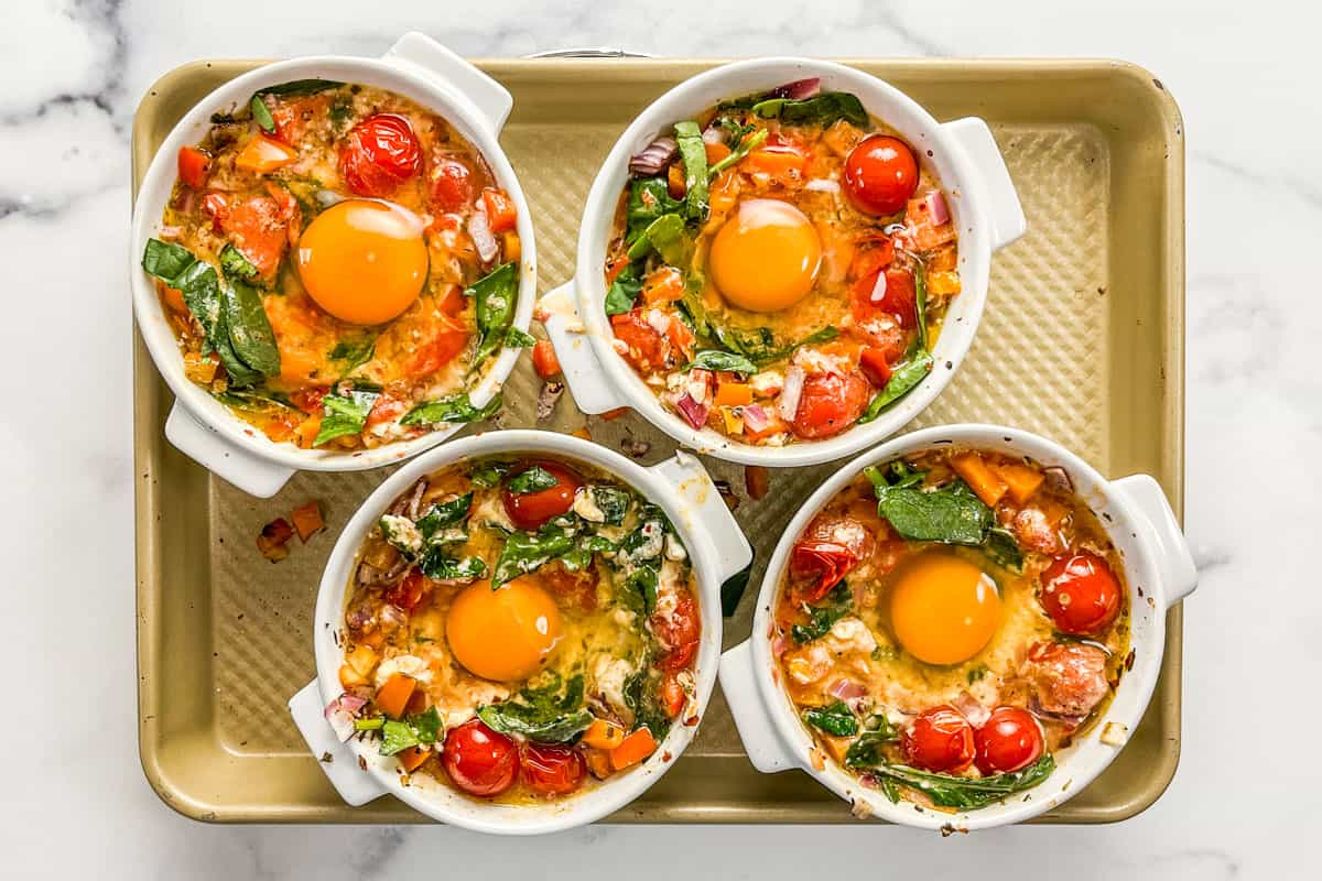 Baked Feta Eggs with Burst Tomatoes and Spinach