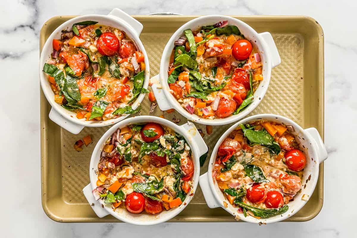 Baked Feta Eggs with Burst Tomatoes and Spinach