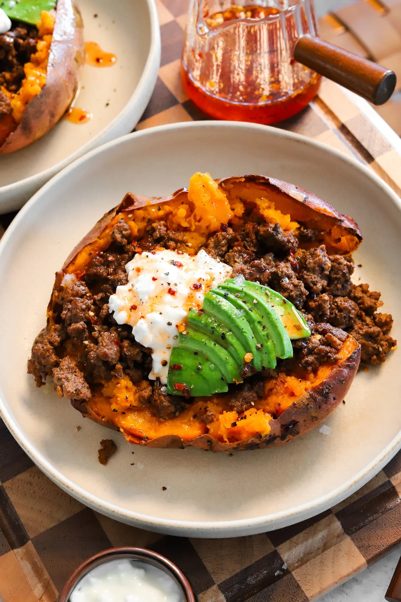 Loaded Sweet Potatoes with Spiced Beef, Cottage Cheese, and Hot Honey